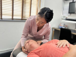 Chiropractor in Littlehampton Alex Liu Neck Adjustment web